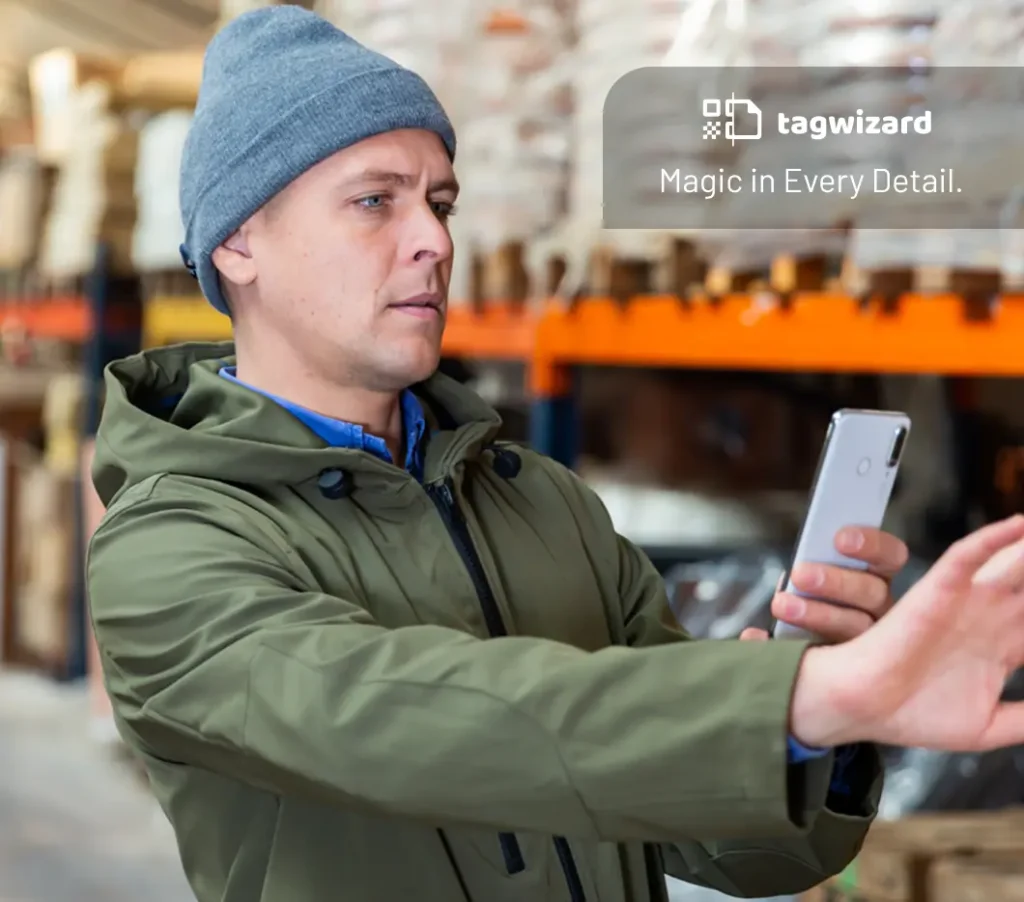 Man-using-his-mobile-phone-to-tag-assets-and-detect-refrigerant-leaks